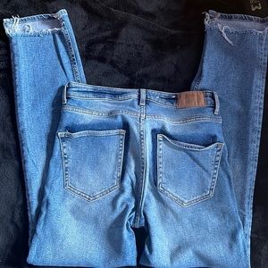 Slim Cut Fringe Bottom Jeans